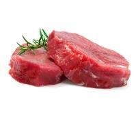 Raw beef steaks, garnished with fresh rosemary