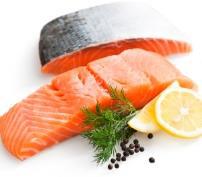 Fresh salmon fillets, garnished with lemon slices